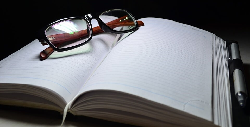 Notebook and glasses